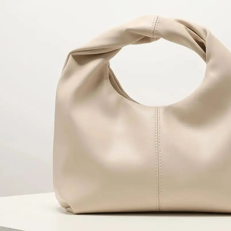 Gelyn Clutch Leather Bag